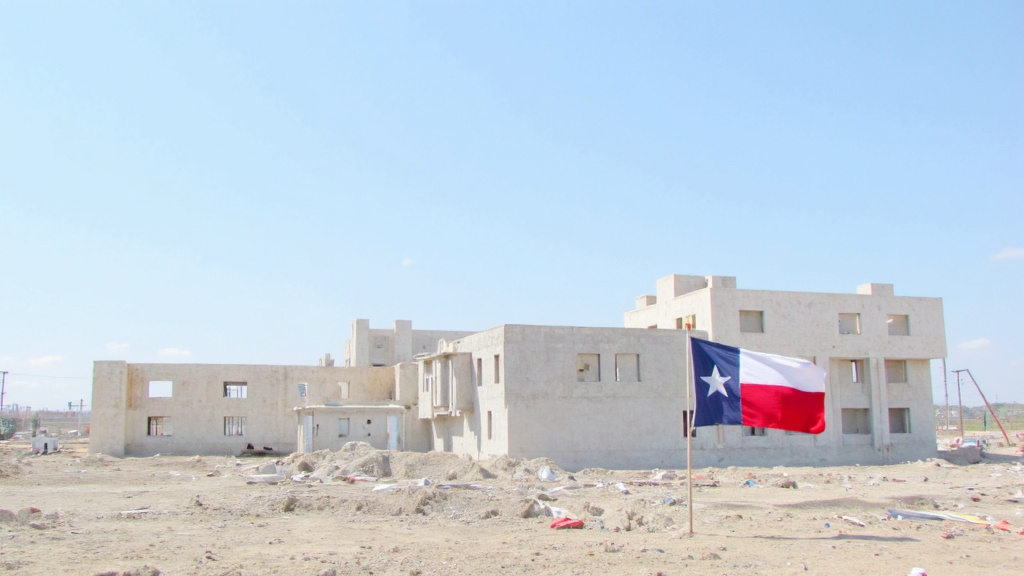 Construction Site Transformation in Texas Split screen showing a small construction site transforming into a large development project with the Texas flag in the background.