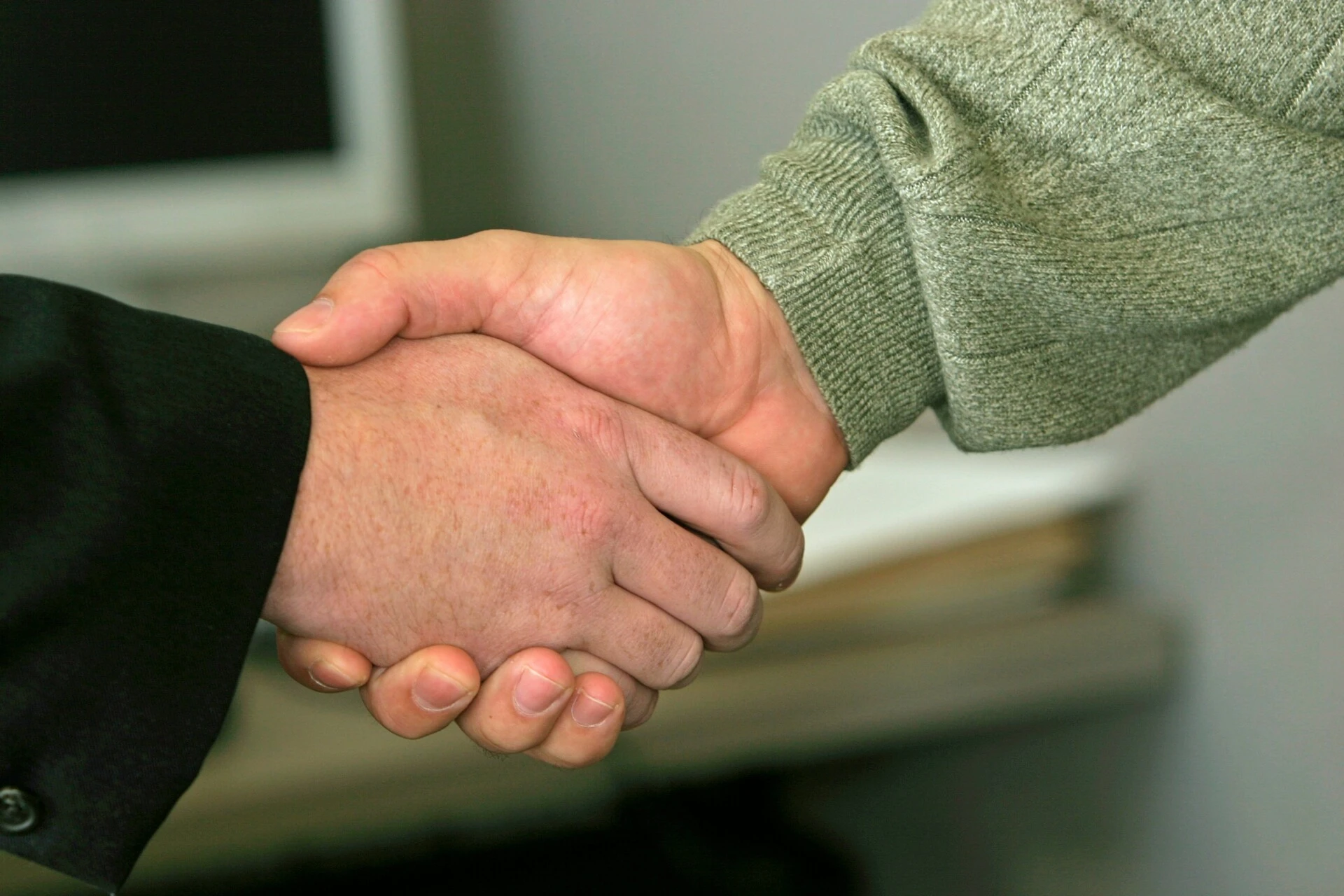 Business Handshake Close-up of two hands shaking